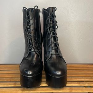 LIGHTLY WORN black platform heels